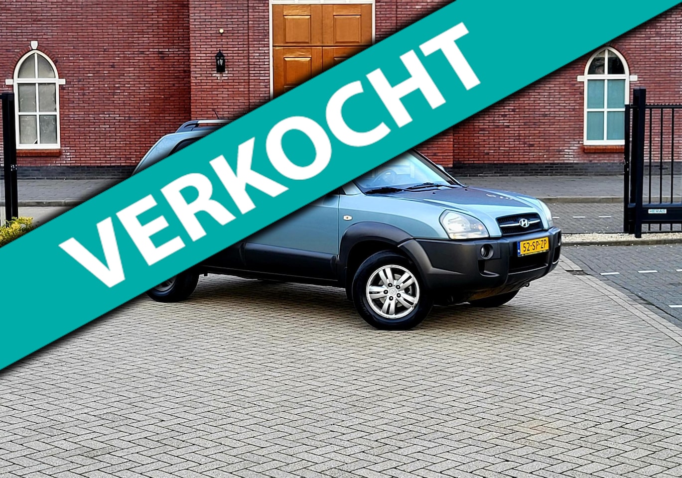 Hyundai Tucson - 2.0i Dynamic / Airco / Nap / Cruise control / 1e Eigenaar / Trekhaak - AutoWereld.nl