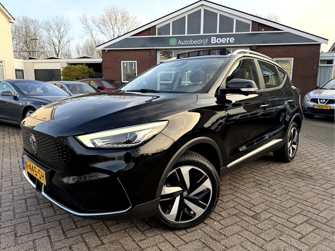 MG ZS - EV Long Range Luxury 70 kWh SOH 92,4%, Panoramadak, Leer, 360 camera - AutoWereld.nl