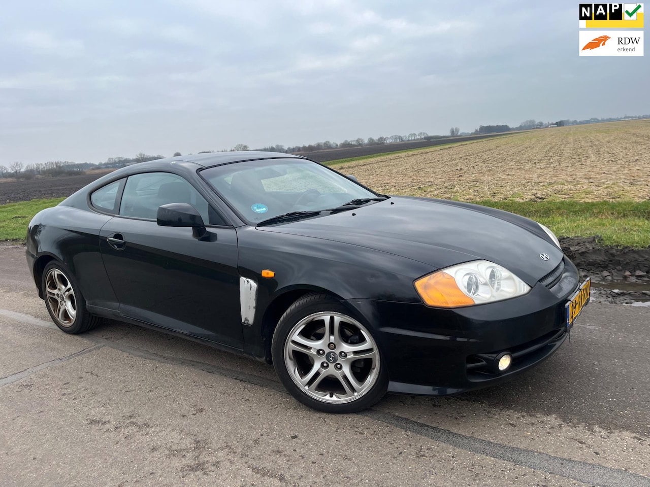 Hyundai Coupé - 2.0i-16V Dynamic / nwe apk - AutoWereld.nl