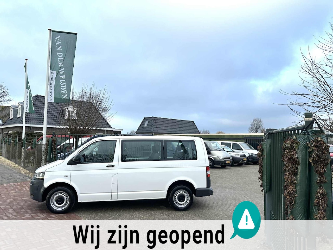 Volkswagen Transporter Kombi - 2.0 TDI L1H1 3 + 3 + 3 AUTOMAAT MARGE - AutoWereld.nl