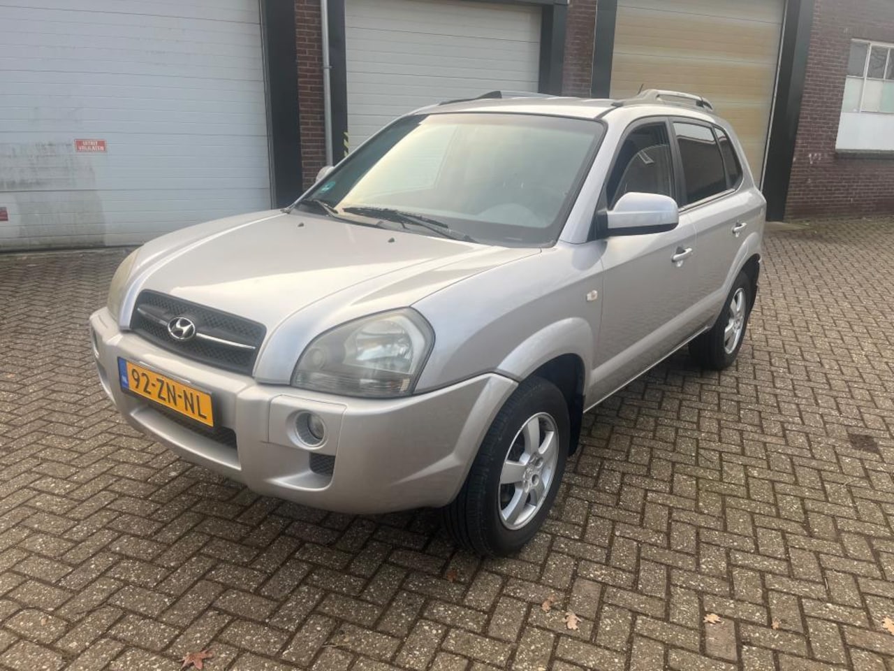 Hyundai Tucson - 2.0i Active CLIMA / LEER - AutoWereld.nl