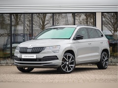 Skoda Karoq - 1.5 TSI ACT Sportline Business | Trekhaak | Adapt. Cruise | Camera | 19" | Winterpakket