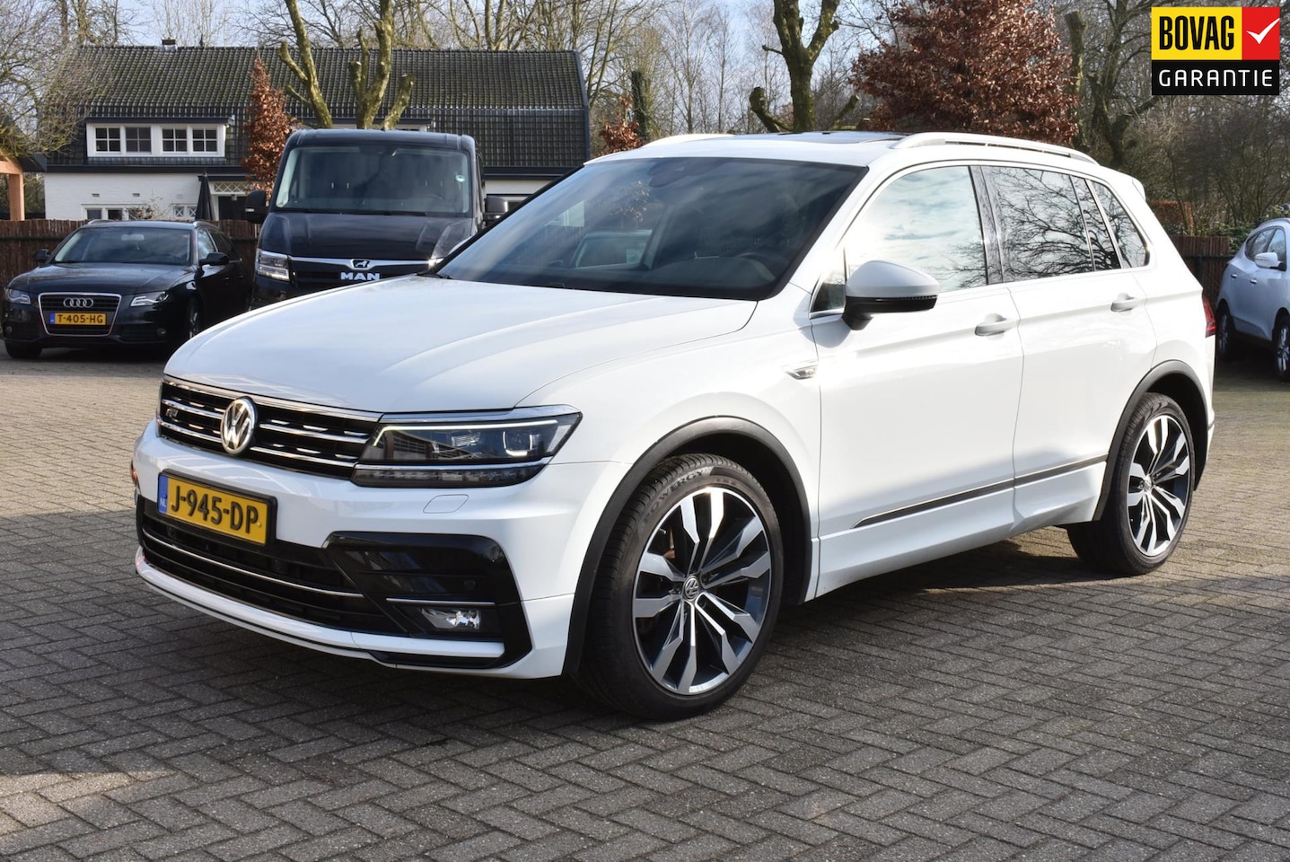 Volkswagen Tiguan - 2.0 TSI 4Motion Highline Business R 2.0 TSI 4Motion Highline Business R - AutoWereld.nl