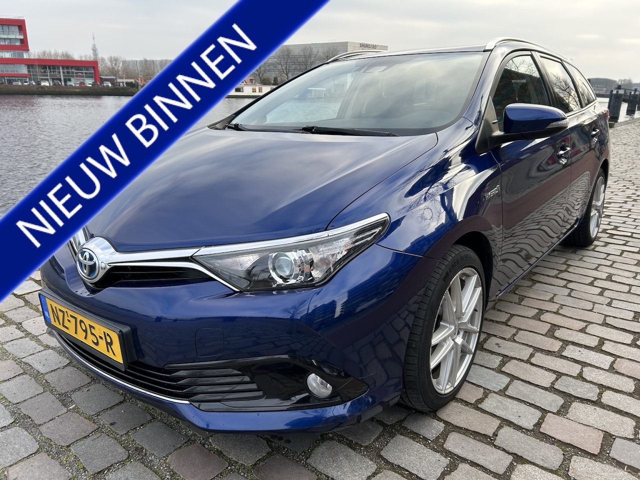 Toyota Auris Touring Sports - 1.8 Hybrid Dynamic airco/ecc navi/camera - AutoWereld.nl
