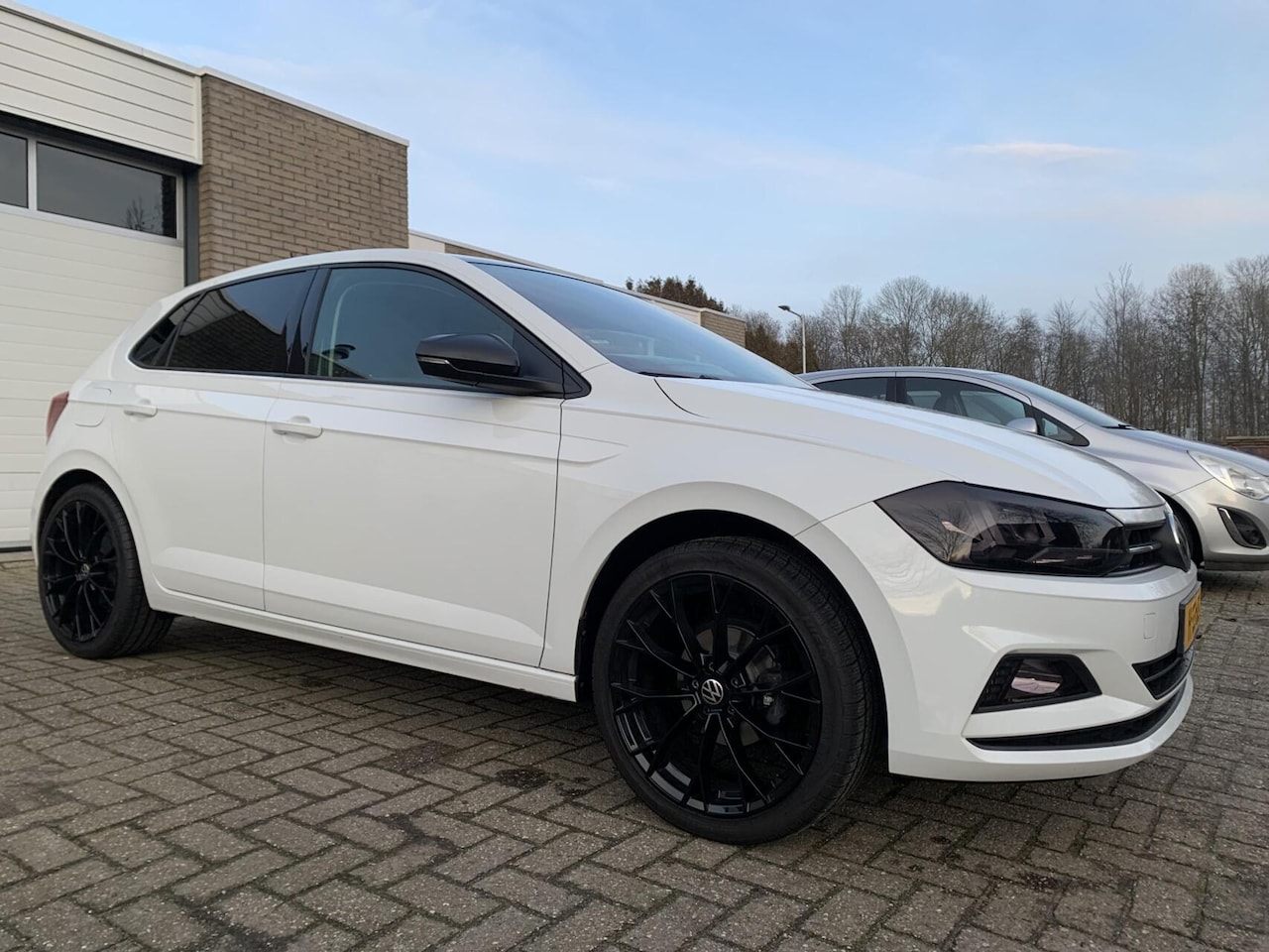 Volkswagen Polo - 1.0 TSI Highline NWE APK/KOPPELING Adpt Cruise Airco CarPlay 18” LM velgen - AutoWereld.nl