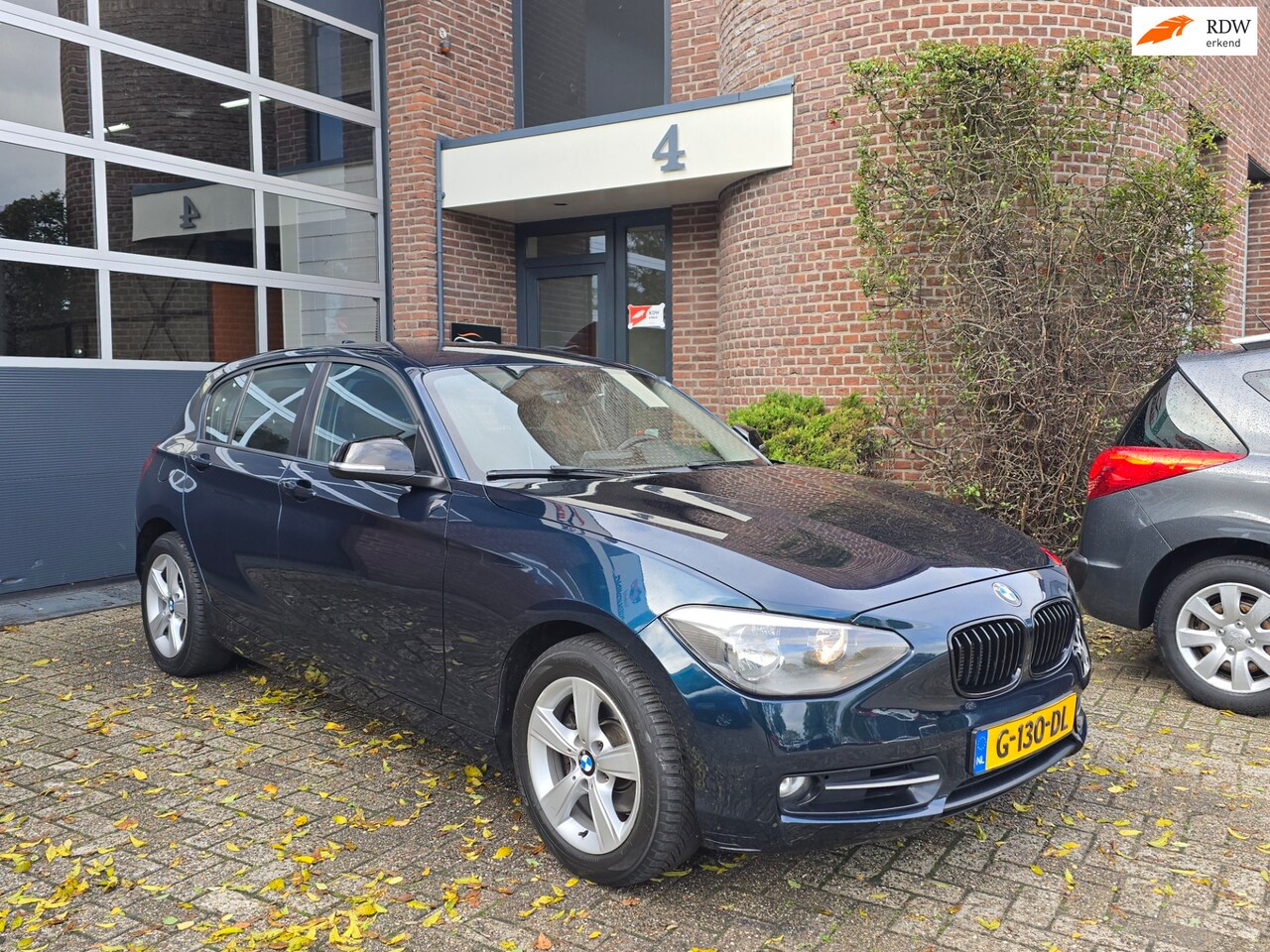 BMW 1-serie - 118i Business Sport |Apk |Cruise - AutoWereld.nl