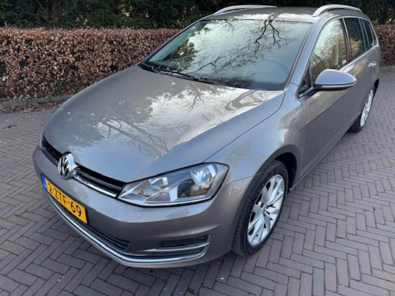 Volkswagen Golf Variant - 1.2TSI HIGHLINE TREKHAAK/HLEER/NAVI/CRUISE/APK - AutoWereld.nl