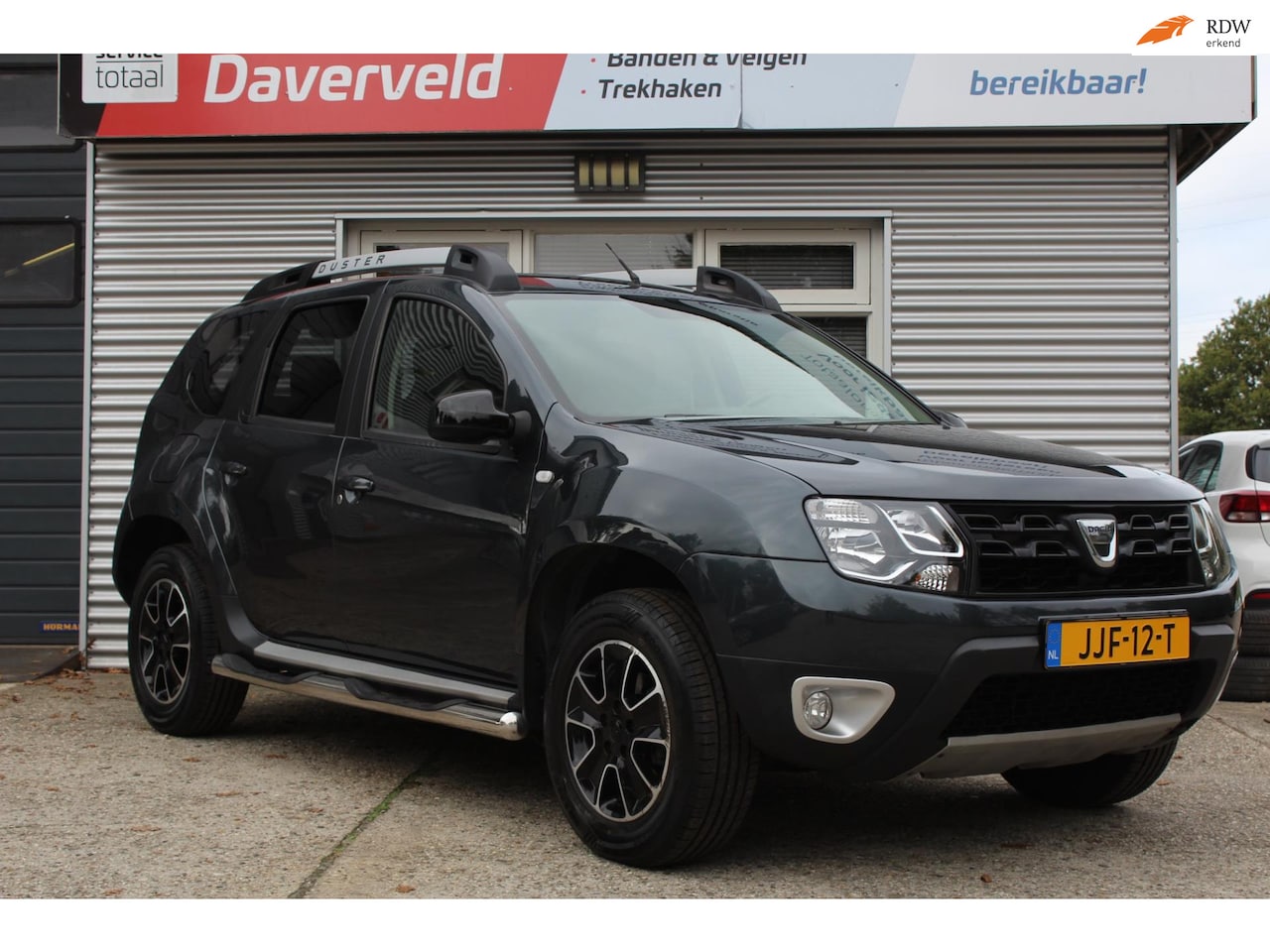 Dacia Duster - 1.2 TCe 4x2 Blackshadow nieuwe distributie-set, trekhaak, side-steps, boekjes, navigatie, - AutoWereld.nl
