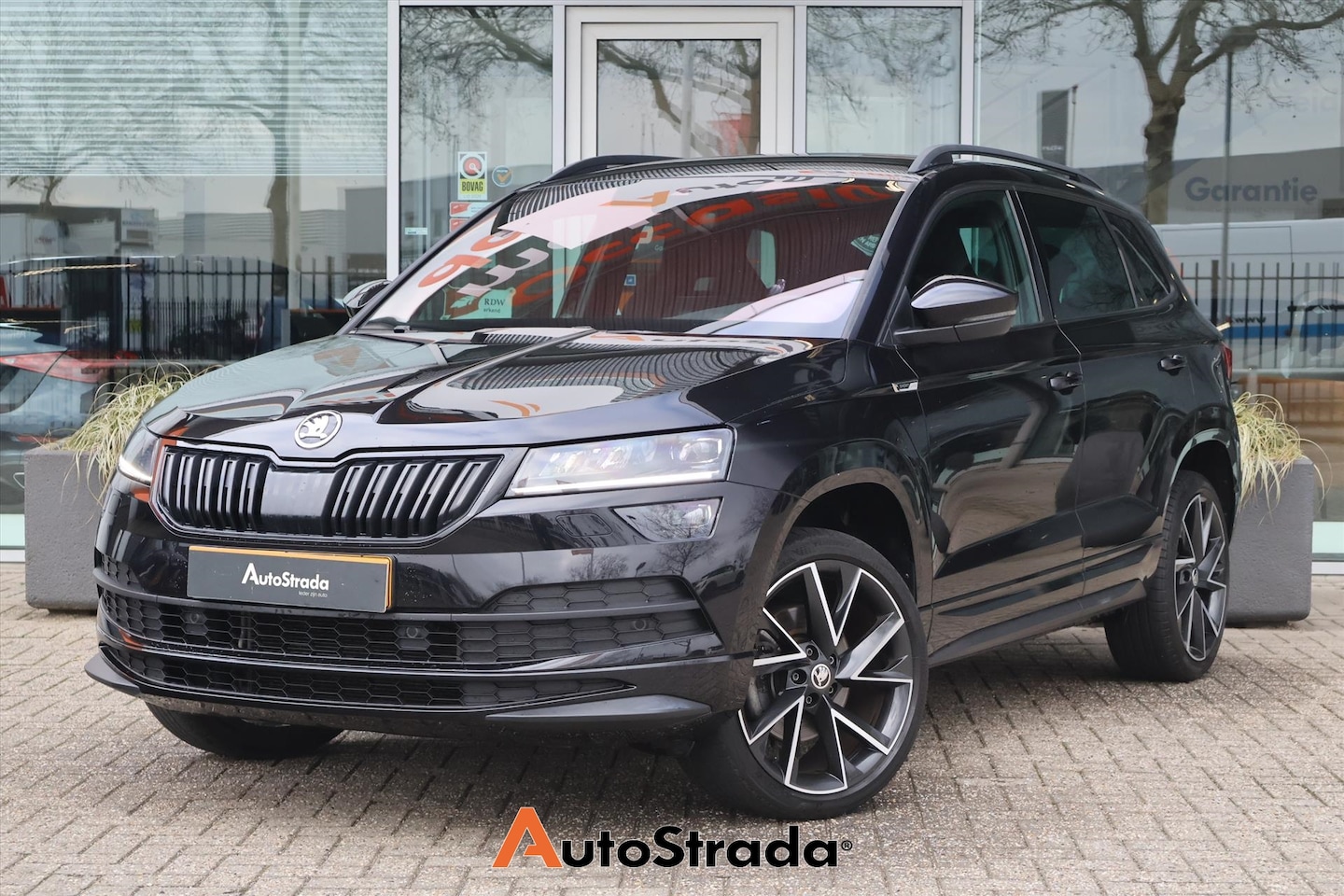 Skoda Karoq - 1.5 TSI SportLine 150pk | Camera | Virtual | Climate | Virtual | LED | Trekhaak | Carplay - AutoWereld.nl