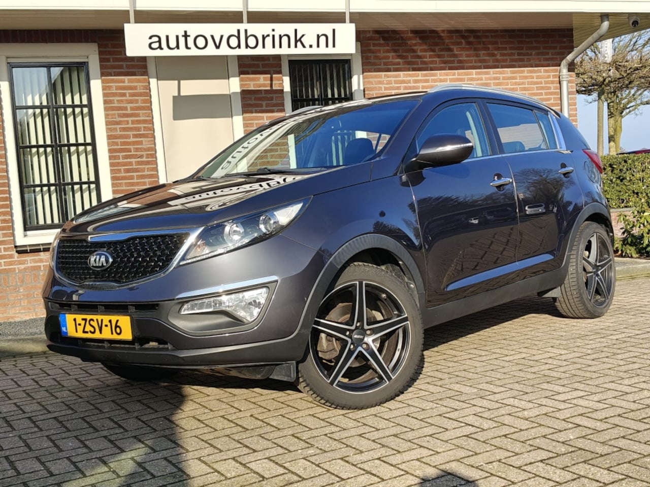 Kia Sportage - 1.6 GDI BusinessLine 1.6 GDI BusinessLine, CAMERA / NAVI / NAP - AutoWereld.nl