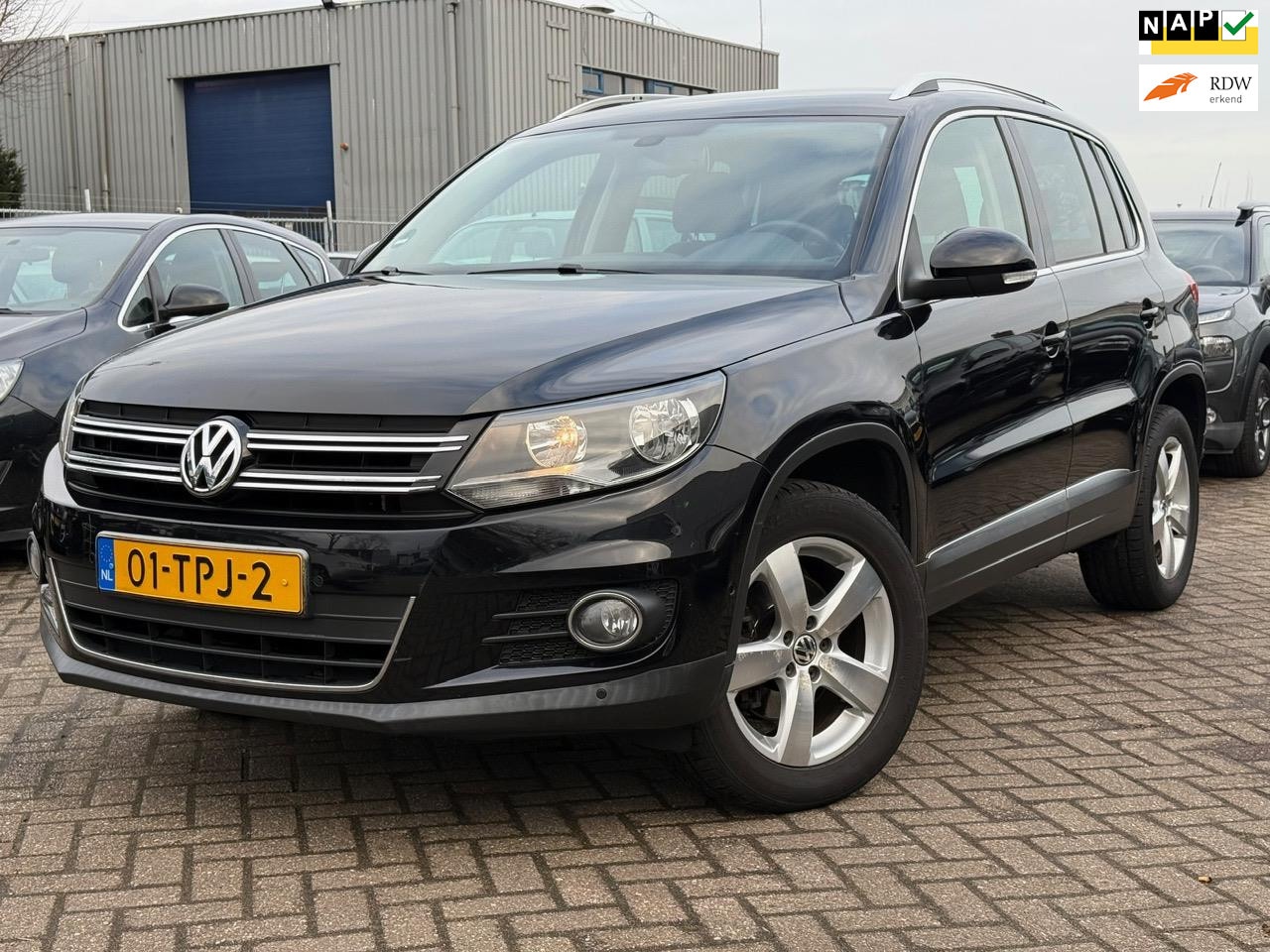 Volkswagen Tiguan - 1.4 TSI Sport&Style - AutoWereld.nl