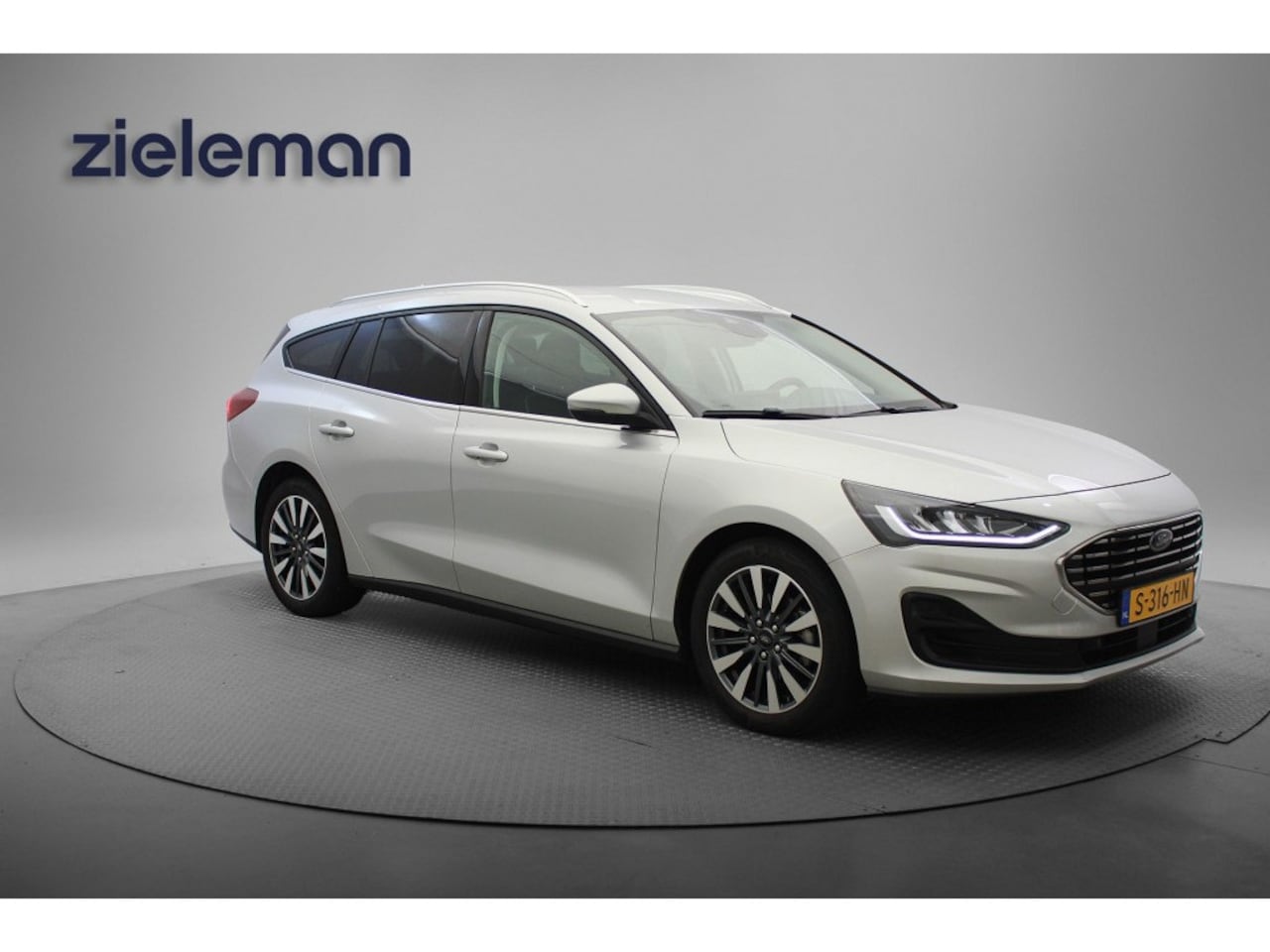 Ford Focus Wagon - 1.0 EcoBoost Hybrid Titanium X 1.0 EcoBoost Hybrid Titanium X wagon - Carplay, Navi, Cruise, Ca - AutoWereld.nl