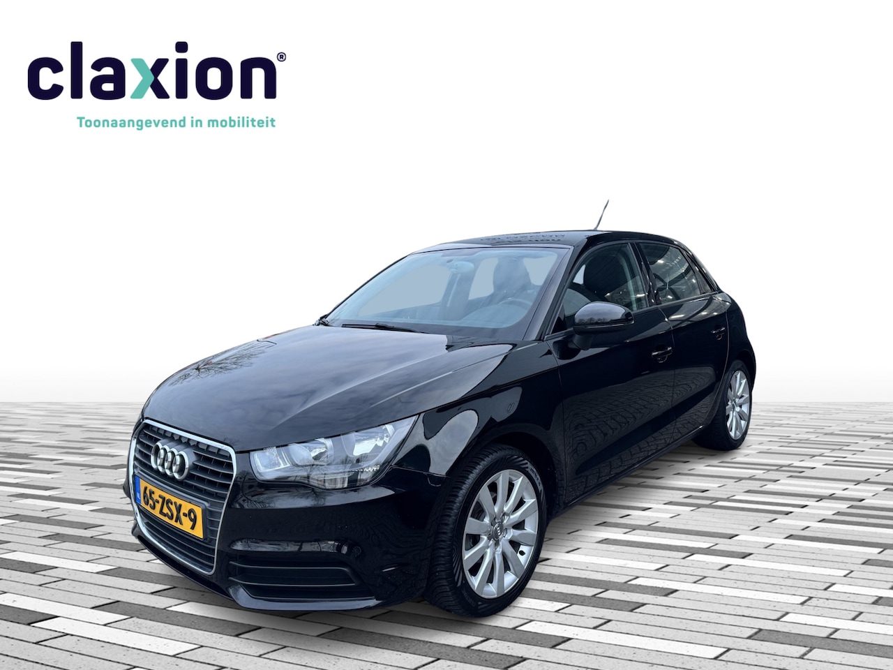 Audi A1 Sportback - 1.2 TFSI Attraction Cruise / Navi / BT - AutoWereld.nl