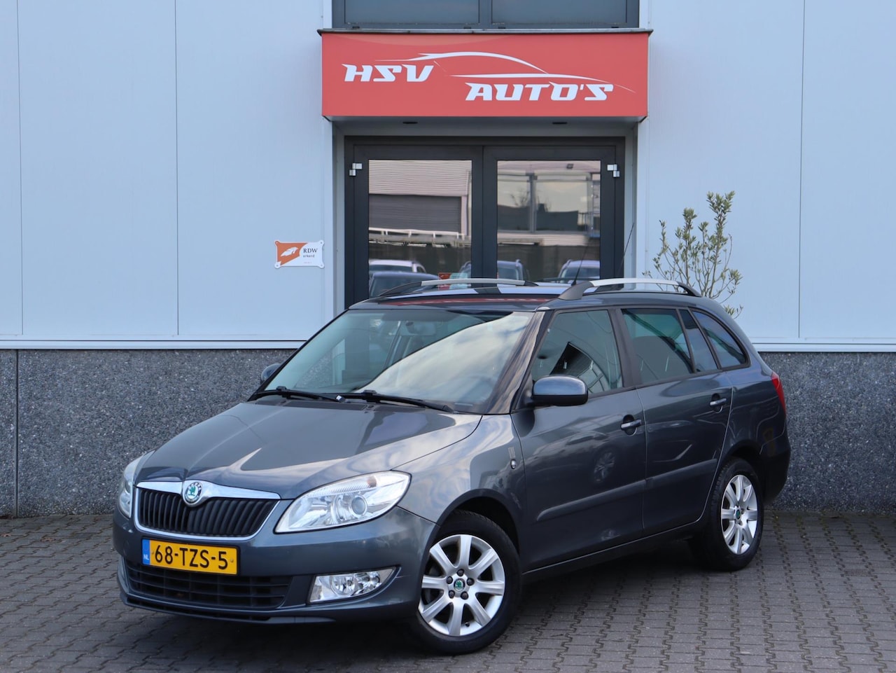Skoda Fabia Combi - 1.2 TSI Style airco LM navi org NL - AutoWereld.nl