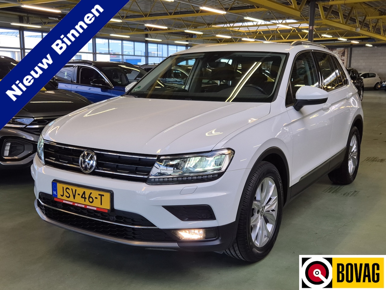 Volkswagen Tiguan - 1.5 TSI ACT Highline -150pk- Automaat | Navi | App Connect | Stoelverwarming | Rijklaarpri - AutoWereld.nl