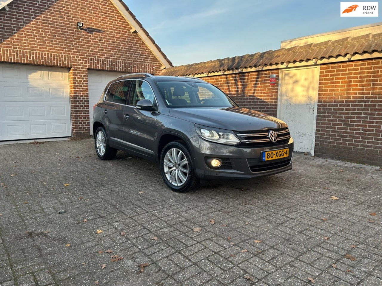 Volkswagen Tiguan - 1.4 TSI Sport&Style - AutoWereld.nl