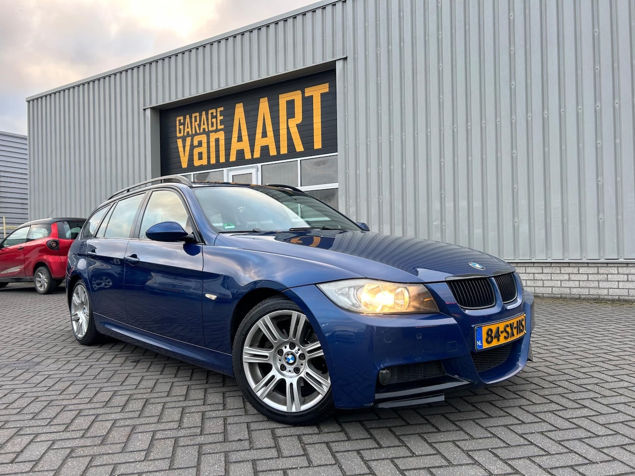 BMW 3-serie Touring - 320i High Executive | M Sport | STOELVERWARM | CRUISE | CLIMATE | NAVI | - AutoWereld.nl