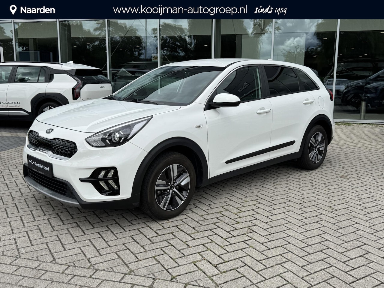 Kia Niro - 1.6 GDi Hybrid ComfortLine Cruise control, achteruitrij camera, navigatie Apple CarPlay/An - AutoWereld.nl