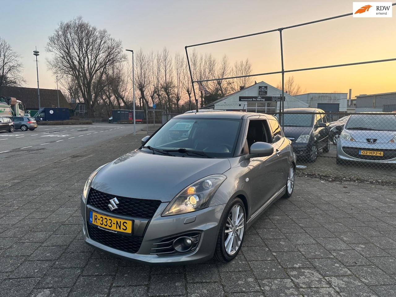 Suzuki Swift - 1.6 Sport Xenon Airco Camera Carplay Stoelverwarm- Volledig onderhoud met KMSTAND 127DKM!! - AutoWereld.nl