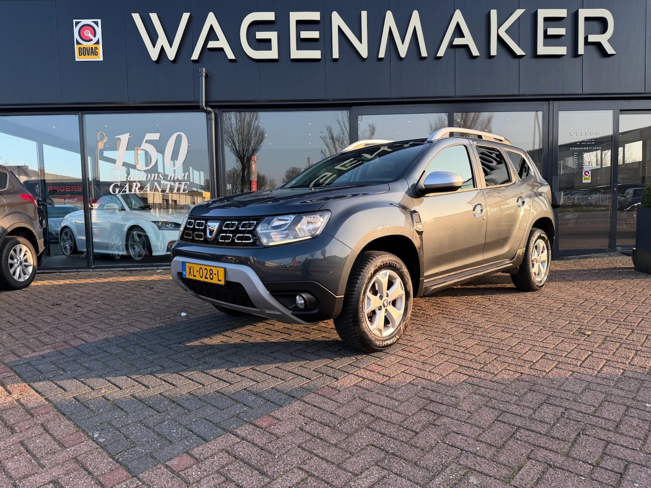 Dacia Duster - 1.2 TCe Comfort Airco|Cruise|Trekhaak|Netjes - AutoWereld.nl