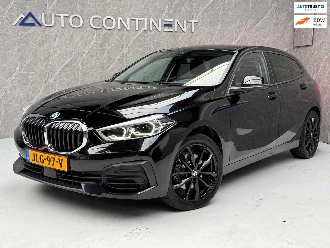 BMW 1-serie - 116d High Executive / Nwe Distr. Ketting - AutoWereld.nl
