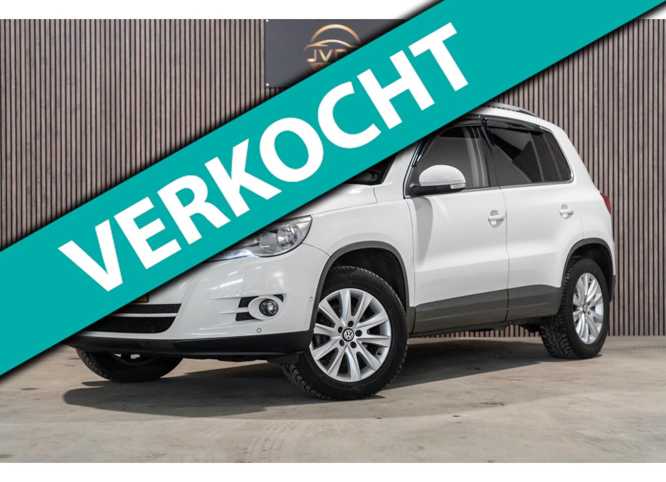 Volkswagen Tiguan - 1.4 TSI 4Motion PANO CAMERA TREKHAAk NAP APK - AutoWereld.nl