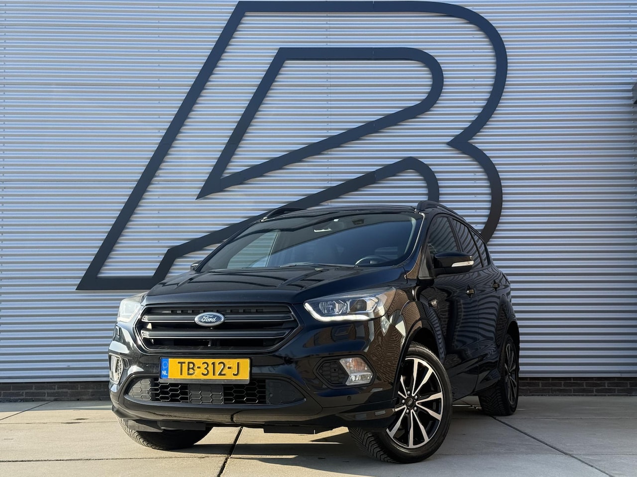 Ford Kuga - 1.5 EcoBoost ST Line Navi,Camera,Trekhaak,Clima,Halfleder,Pdc V+A,120pk,Lm velgen,6 Bak,Ap - AutoWereld.nl