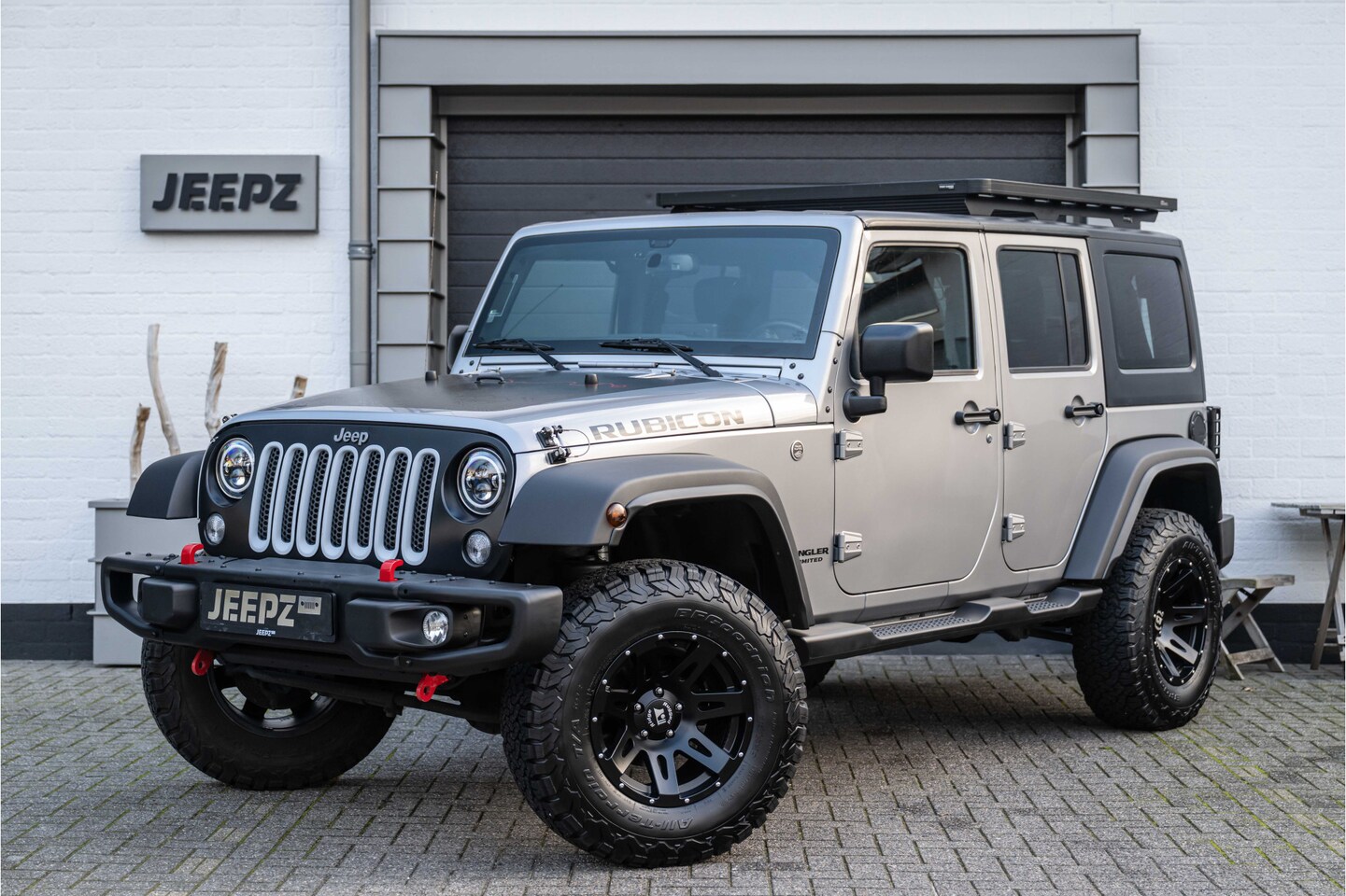 Jeep Wrangler Unlimited - 3.6 Sahara / Rugged Ridge velgen / Roof rack / Lift Kit - AutoWereld.nl