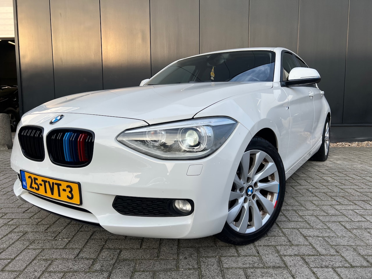 BMW 1-serie - 116i Sport '12 Automaat/Navi/17Lmv/NwKetting! - AutoWereld.nl