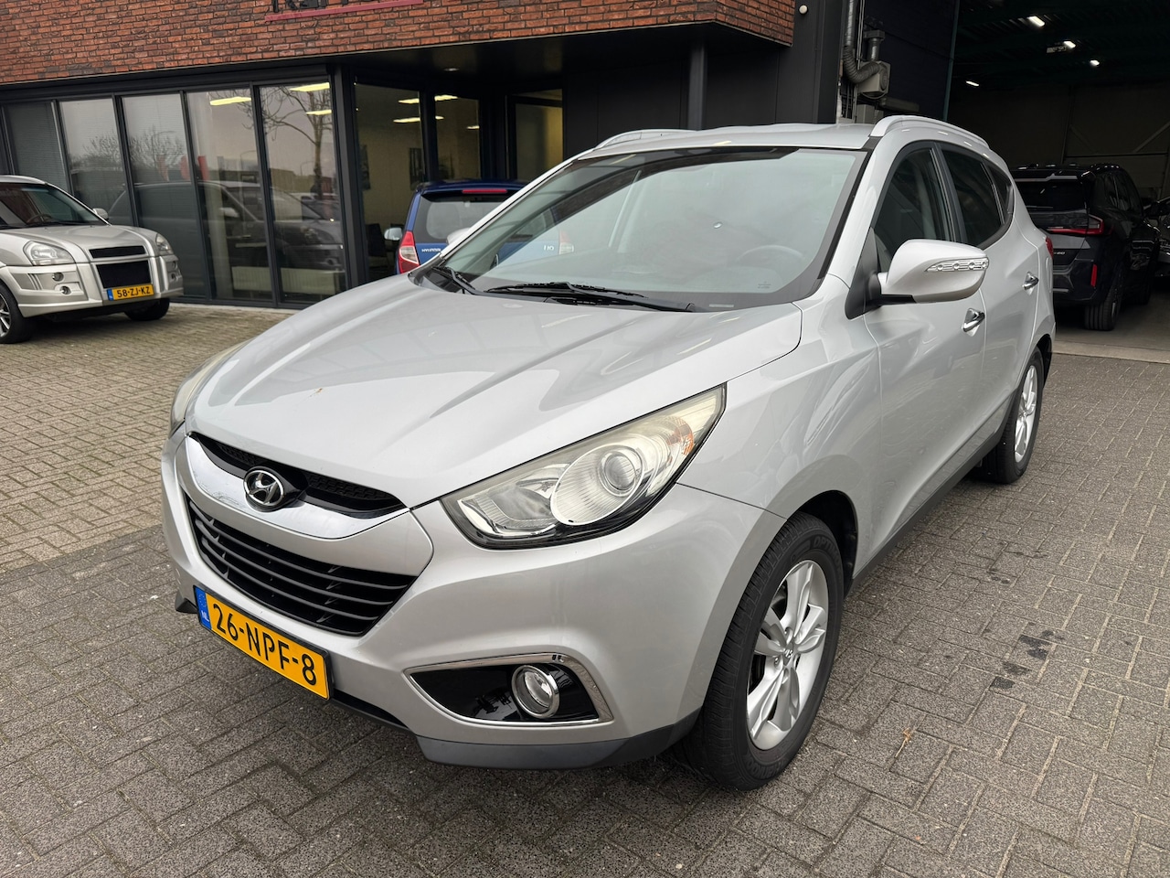 Hyundai ix35 - 2.0i Style CLIMA CAMERA TREKHAAK LEDER ORIG NL NAP - AutoWereld.nl