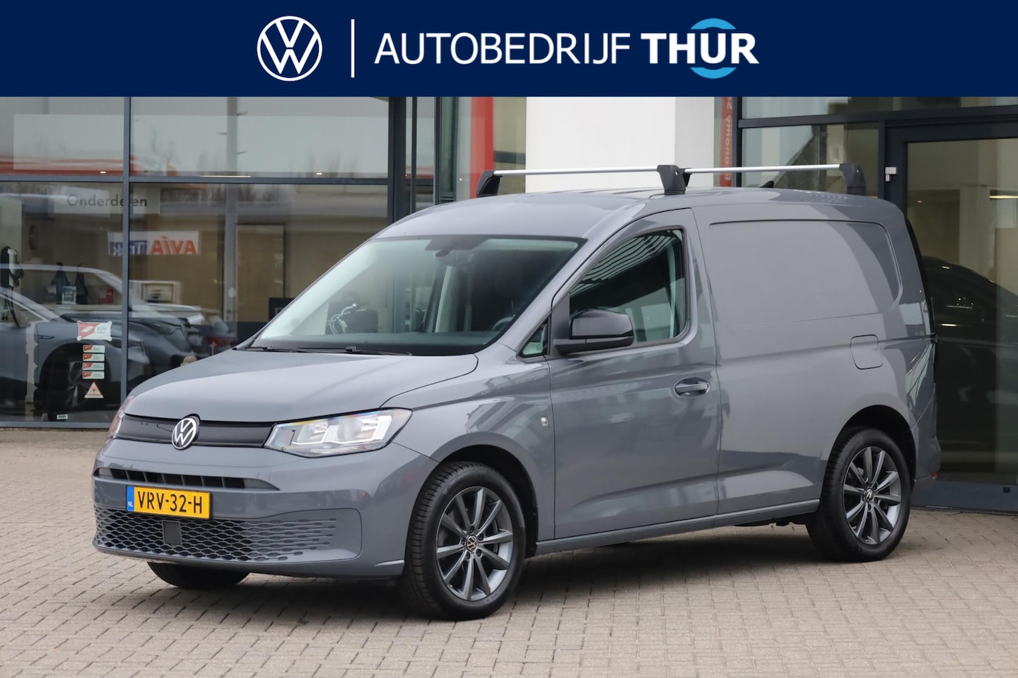 Volkswagen Caddy Cargo - 2.0 TDI Style 2 zone climatronic bumpers in kleur cruise control parkeersensoren navigatie - AutoWereld.nl
