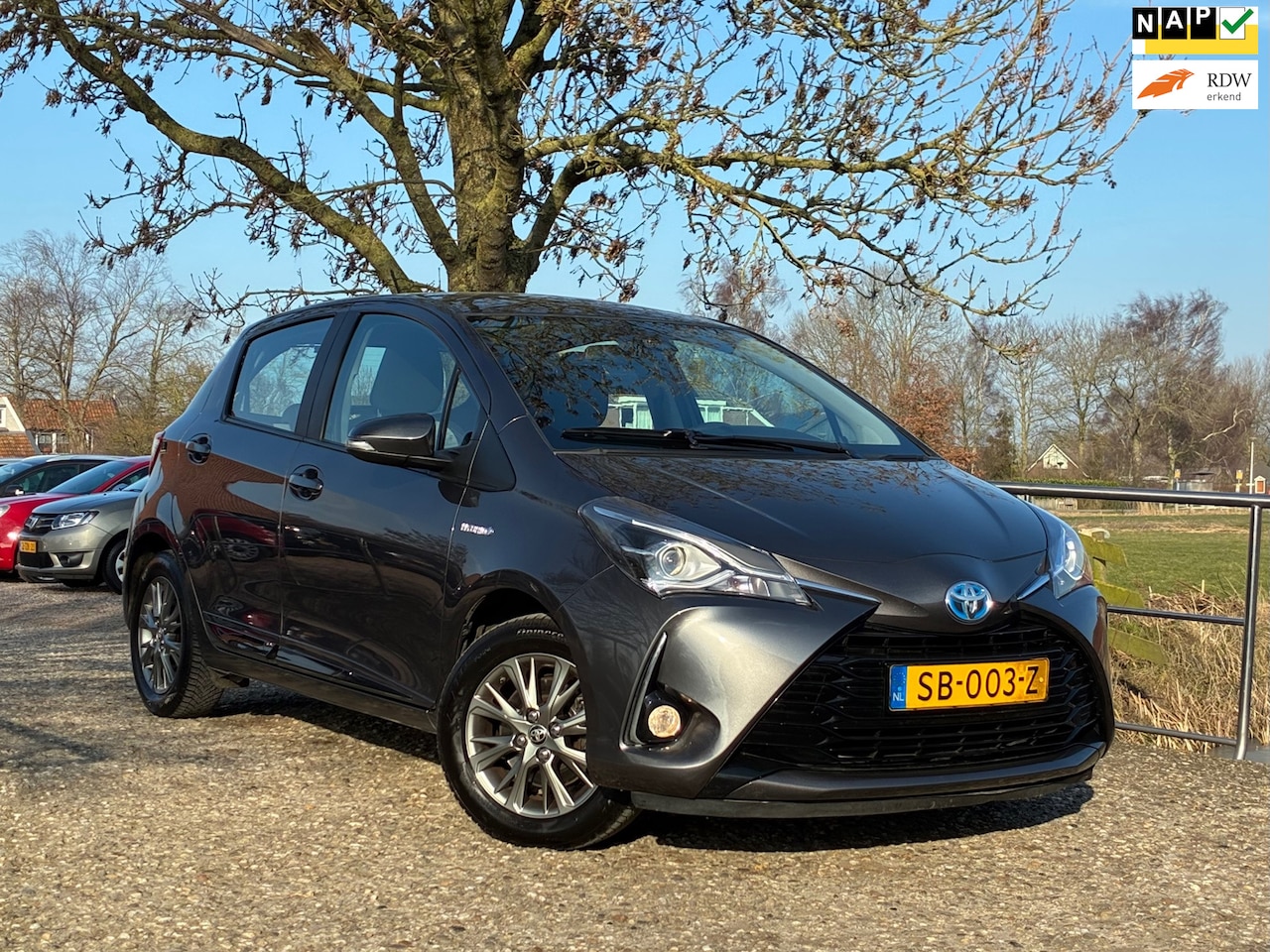 Toyota Yaris - 1.5 Hybrid Design | Navi + Clima + Cruise nu €10.975,-!! - AutoWereld.nl