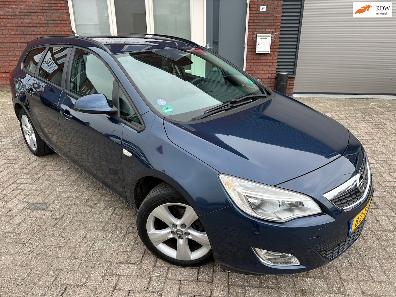 Opel Astra Sports Tourer - 1.4 Turbo Edition / Airco / PDC / NAP - AutoWereld.nl
