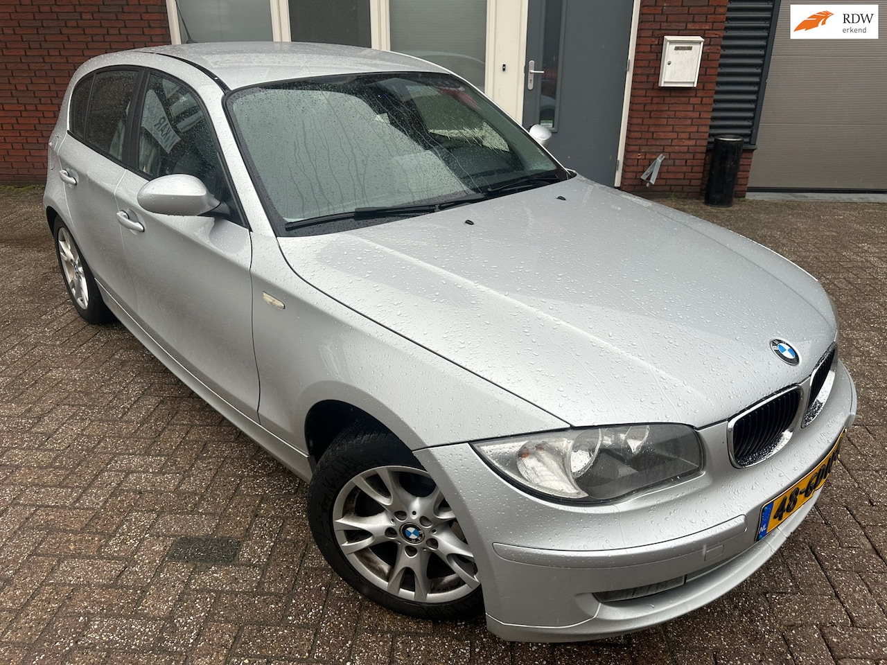 BMW 1-serie - 116i Business Line / Navi / PDC / Clima / Cruise / NAP / AUT - AutoWereld.nl