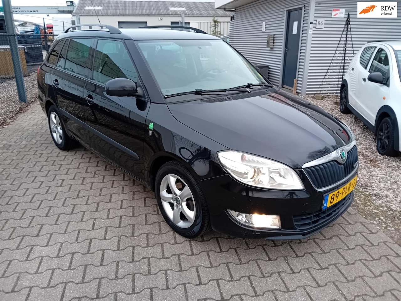 Skoda Fabia Combi - 1.2 TDI Greenline BJ 2011 TREKHAAK!! AIRCO!! - AutoWereld.nl