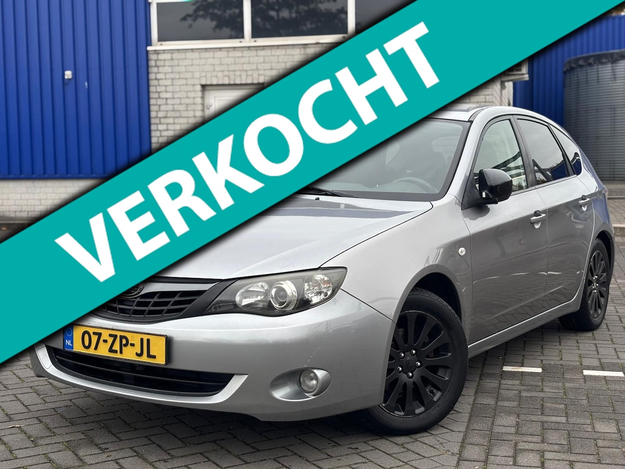 Subaru Impreza - 2.0R Luxury AWD/Airco/Cruise/LMV/NAP/Trekhaak - AutoWereld.nl