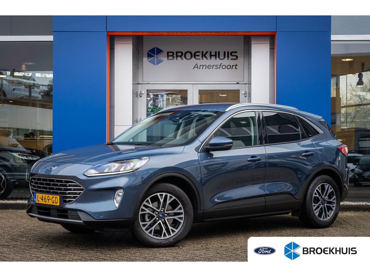 Ford Kuga - 1.5 EcoBoost Titanium | Trekhaak | Stoel/stuur/voorruit verwarming | Camera | Keyless | Ap - AutoWereld.nl