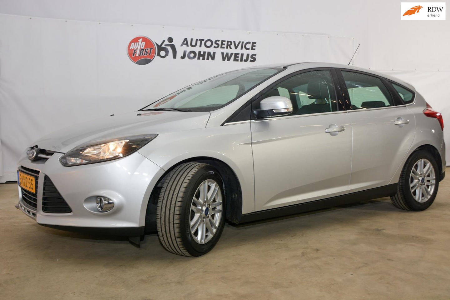 Ford Focus - 1.0 EcoBoost cruise control, park pilot, trekhaak - AutoWereld.nl