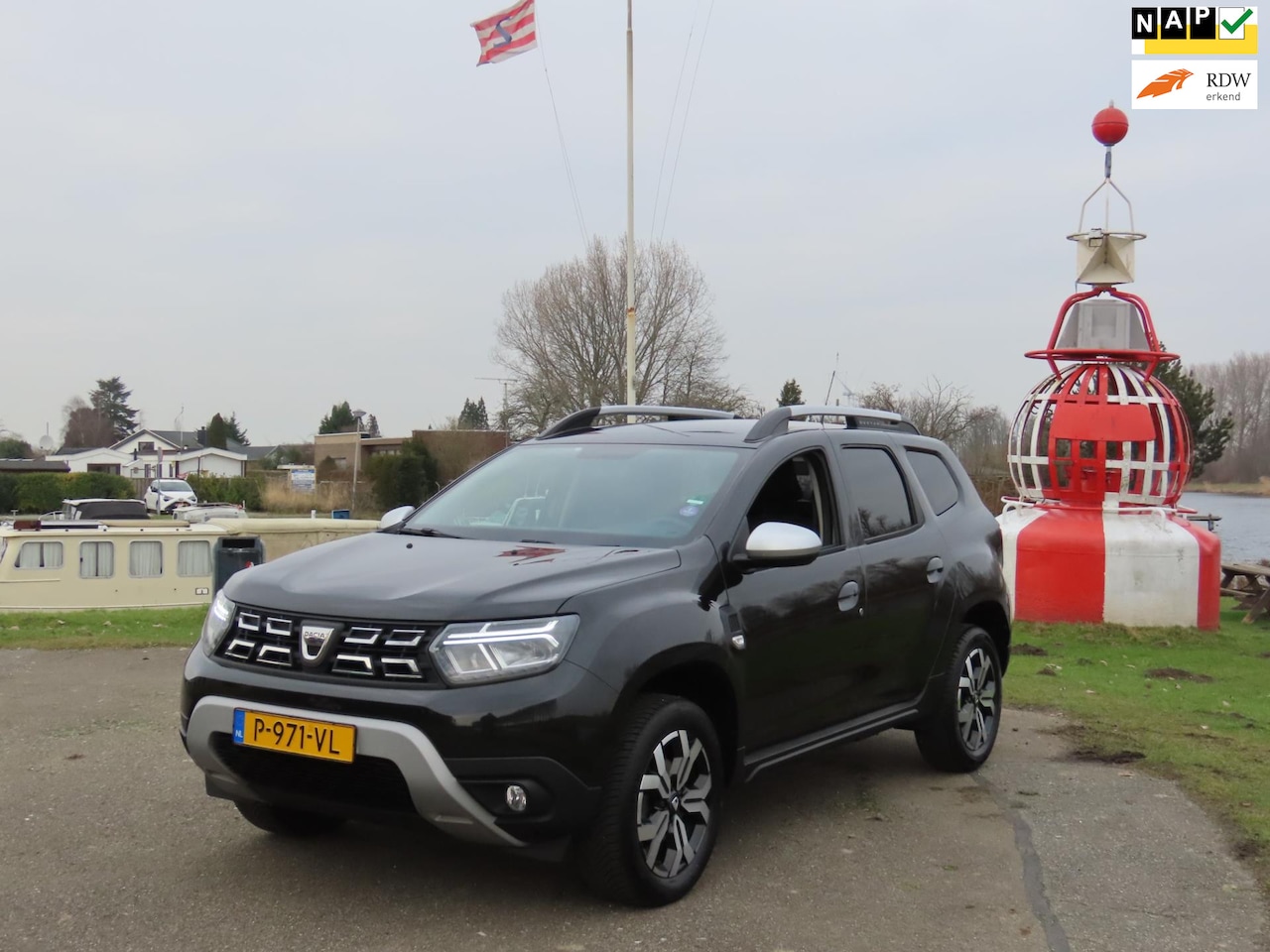 Dacia Duster - 1.0 TCe Bi-Fuel Prestige *1e EIG *Navi *Camera *Cruise *Leer *Keyless - AutoWereld.nl