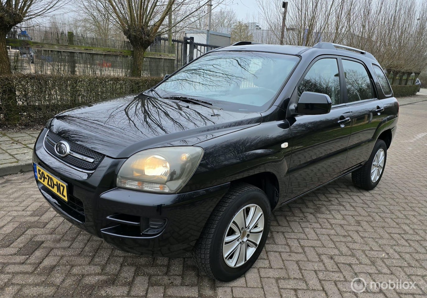 Kia Sportage - 2.0 CVVT X-pect 2.0 CVVT X-pect Nieuwe APK - AutoWereld.nl