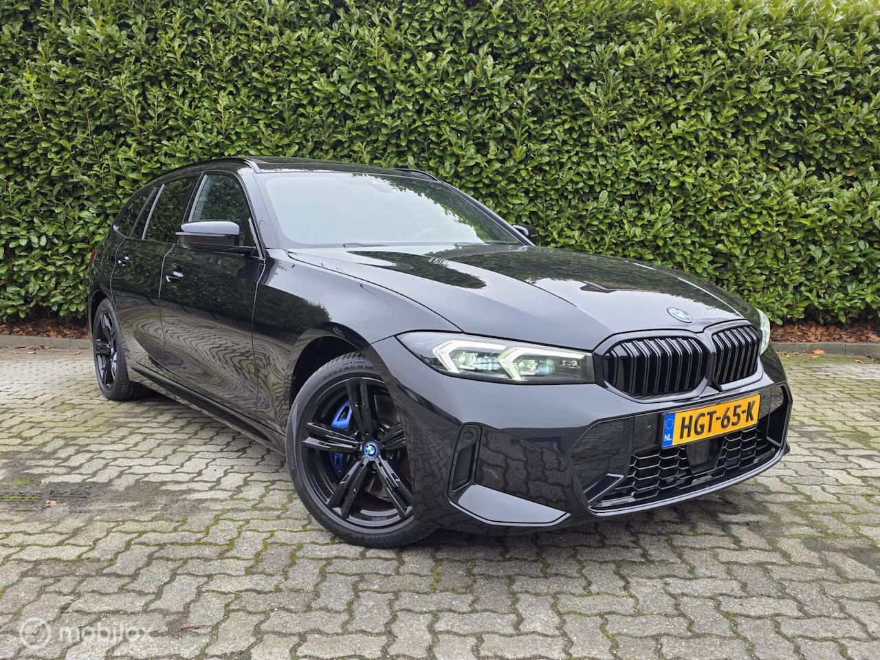 BMW 3-serie Touring - 330e M-sport Pano|Mstoel|LCI|Memory|Keyless - AutoWereld.nl