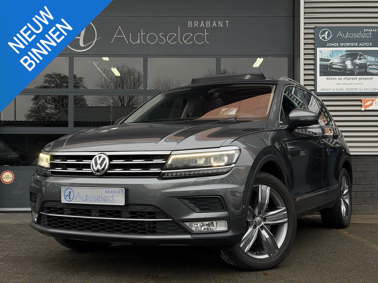 Volkswagen Tiguan - 2.0 TSI 4Motion Highline Pano HUD 360 - AutoWereld.nl