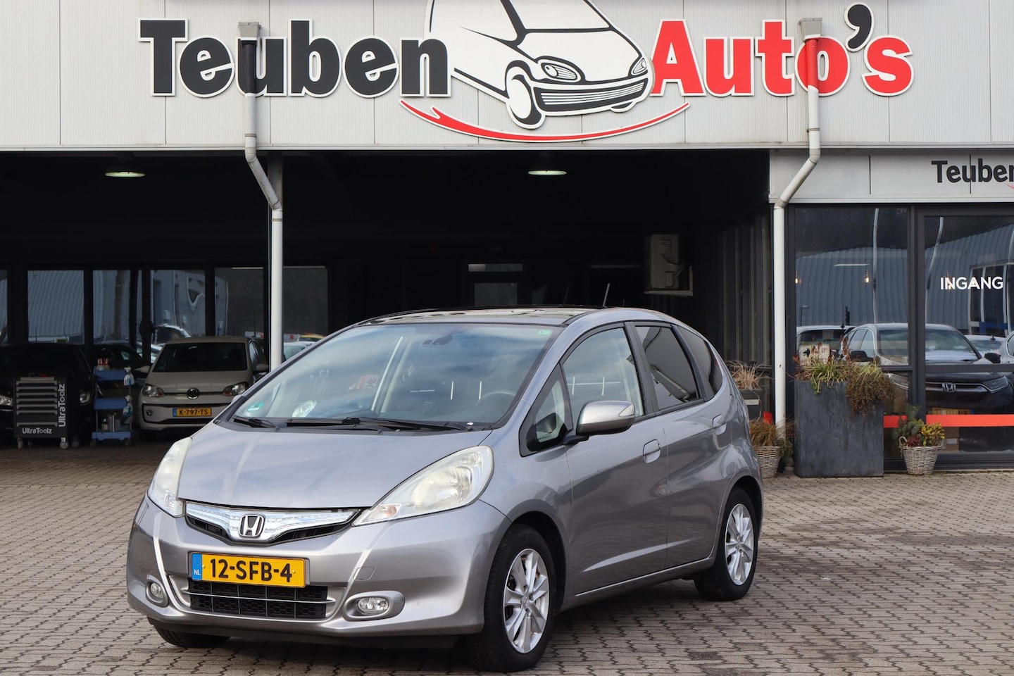 Honda Jazz - 1.4 Hybrid Elegance 1.4 Hybrid Elegance (ZIe foto's), Panoramadak, Automaat, Cruise control, Climate control, - AutoWereld.nl