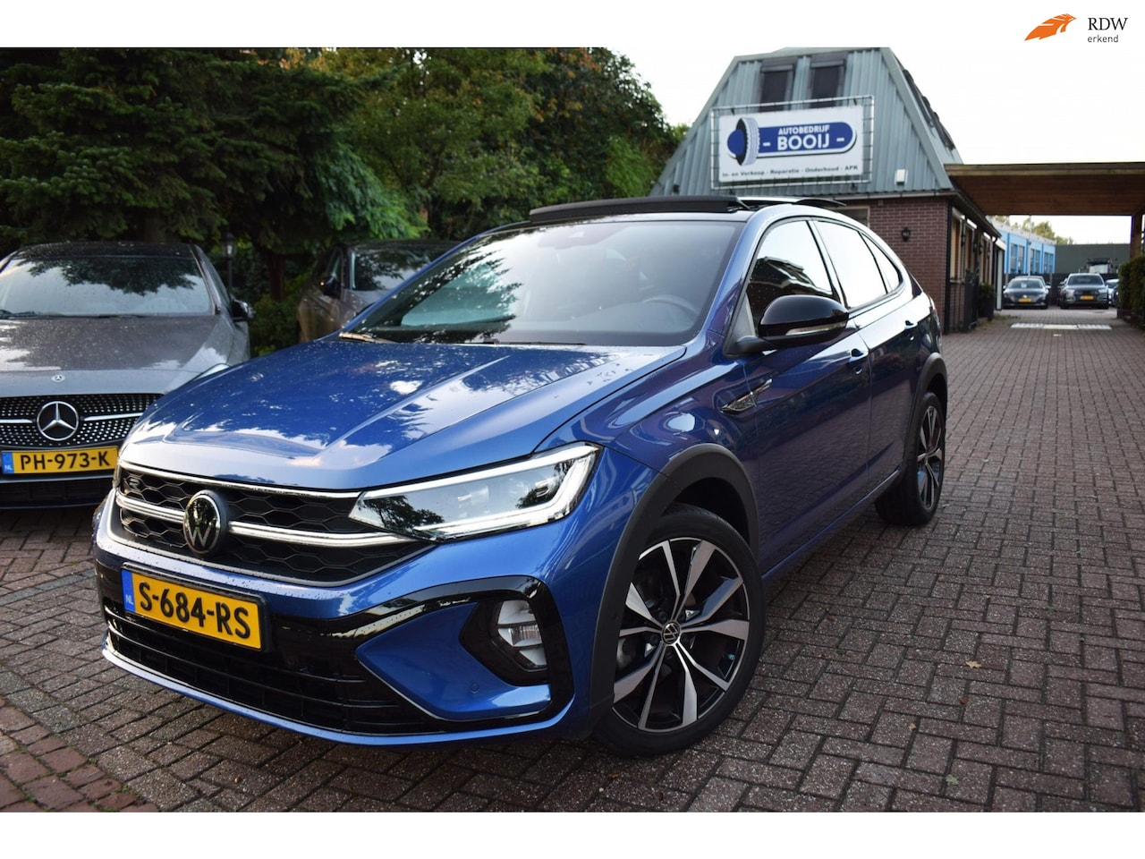 Volkswagen Taigo - 110 PK TSI R-Line Business AUTOM/ADAP CRUISE/PANO DAK/NAVI/CARPLAY/AIRCO-ECC/BLUETOOTH/PDC - AutoWereld.nl