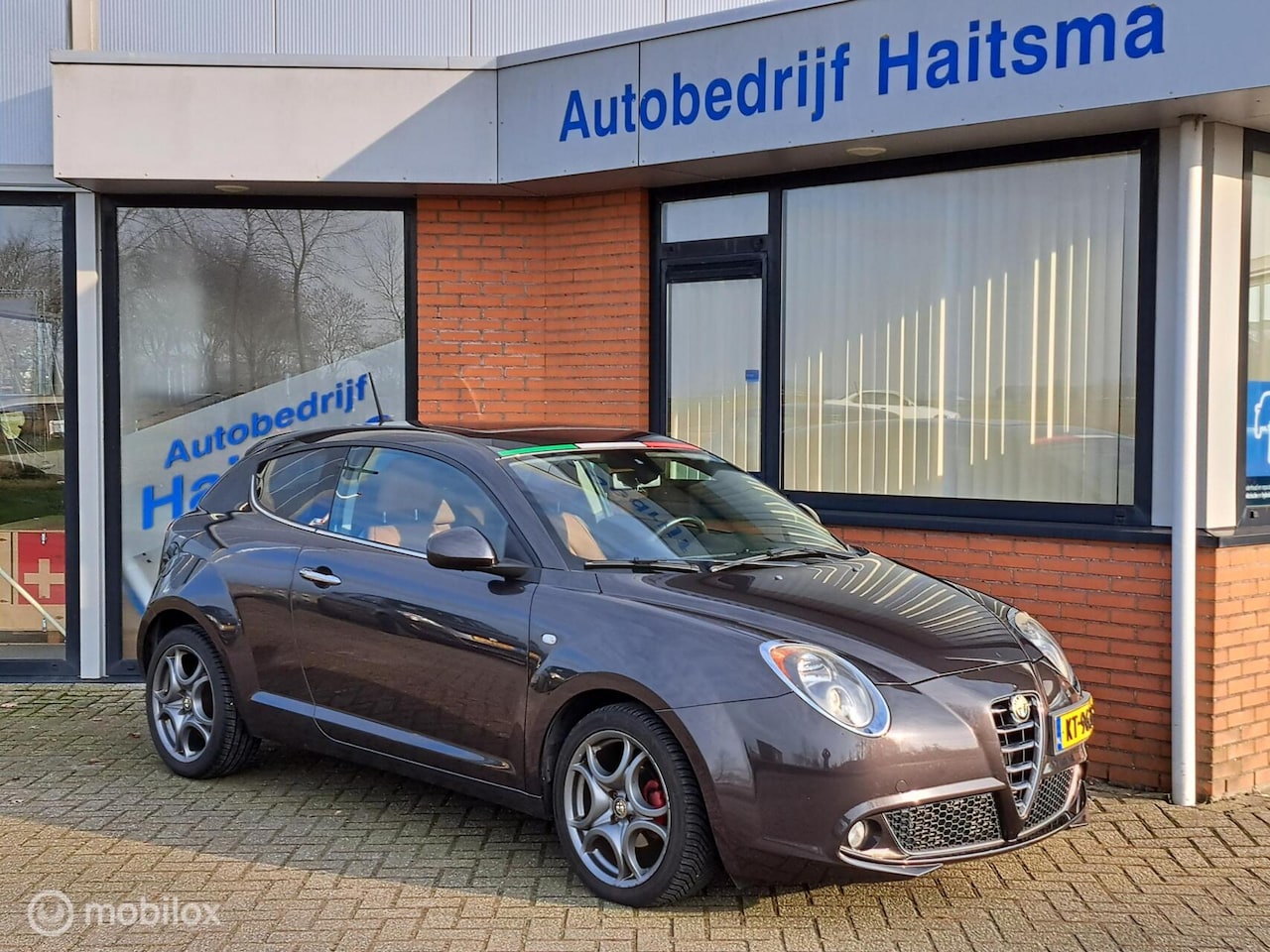 Alfa Romeo MiTo - 0.9 TwinAir Exclusive Airco | Navi | Open dak - AutoWereld.nl