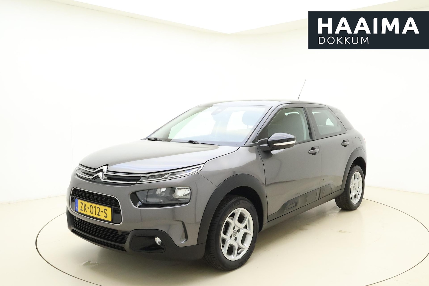 Citroën C4 Cactus - 1.2 PureTech Business 110 Pk | Navigatie | Climate control | Trekhaak | Weinig kilometers - AutoWereld.nl