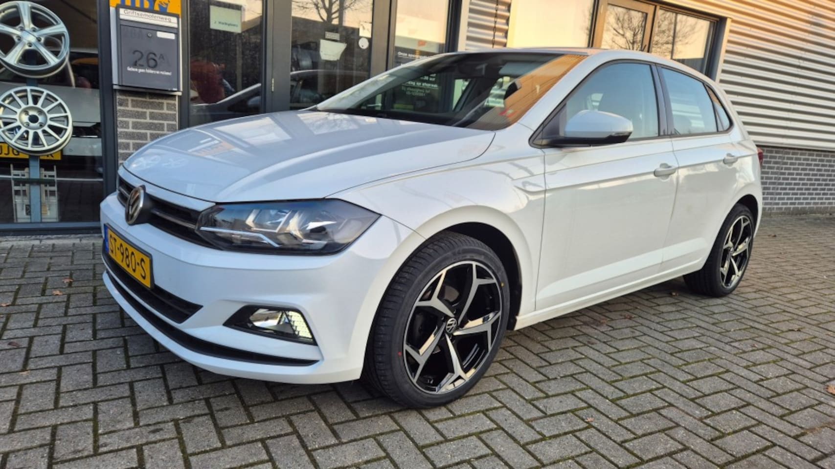 Volkswagen Polo - 1.0i AIRCO ACC CAMERA LV 17 INCH  NAVI CRUISE NAP - AutoWereld.nl