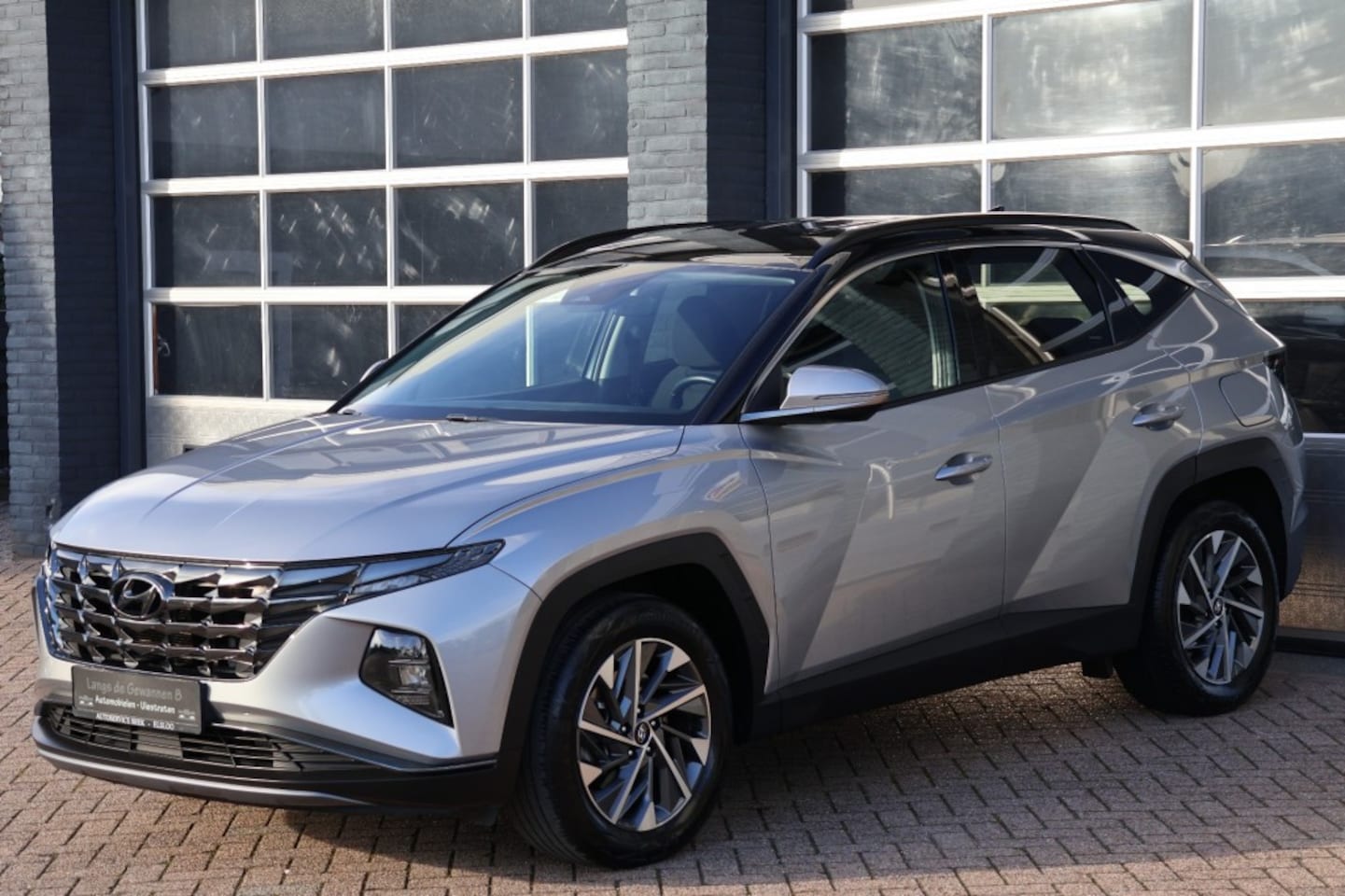 Hyundai Tucson - 1.6 T-Gdi 150 pk comfortline two-tone , 51403 kilometer - AutoWereld.nl