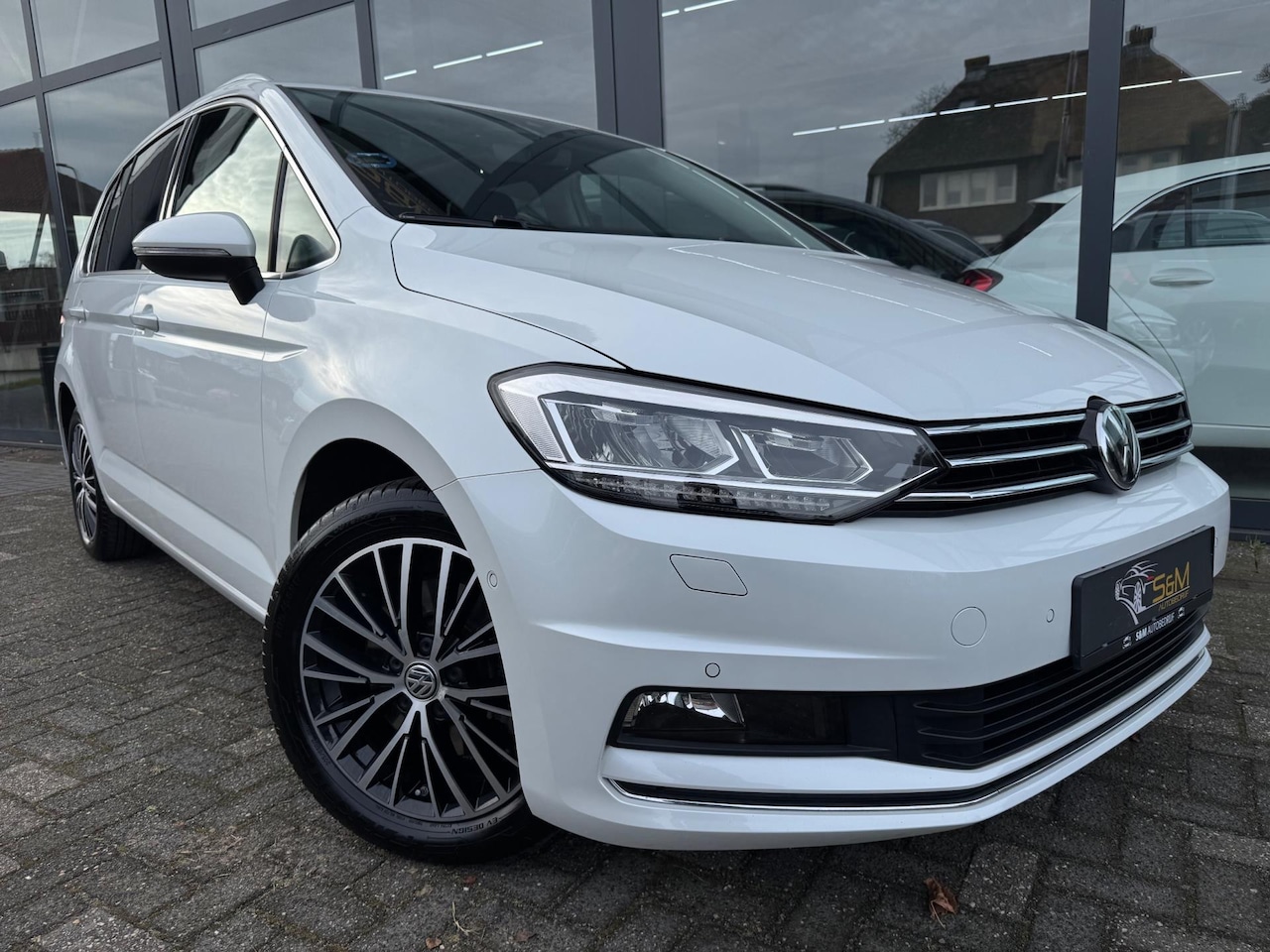 Volkswagen Touran - 1.4 TSI Highline |Pano.| leer |carplay - AutoWereld.nl