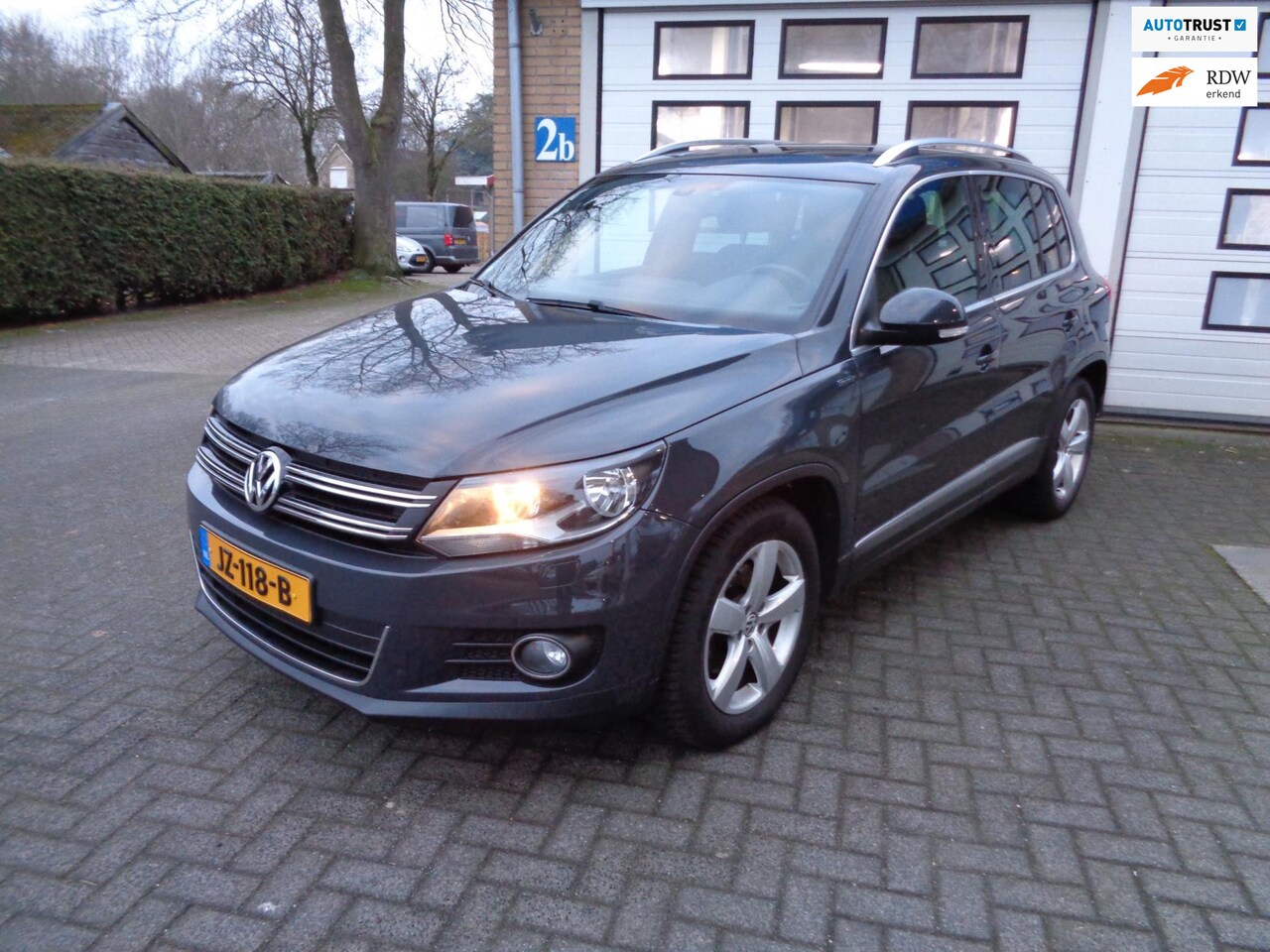 Volkswagen Tiguan - 1.4 TSI Sport&Style - AutoWereld.nl